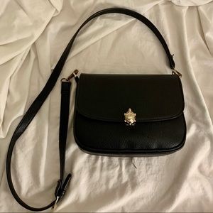 Carpisa turtle clasp bag